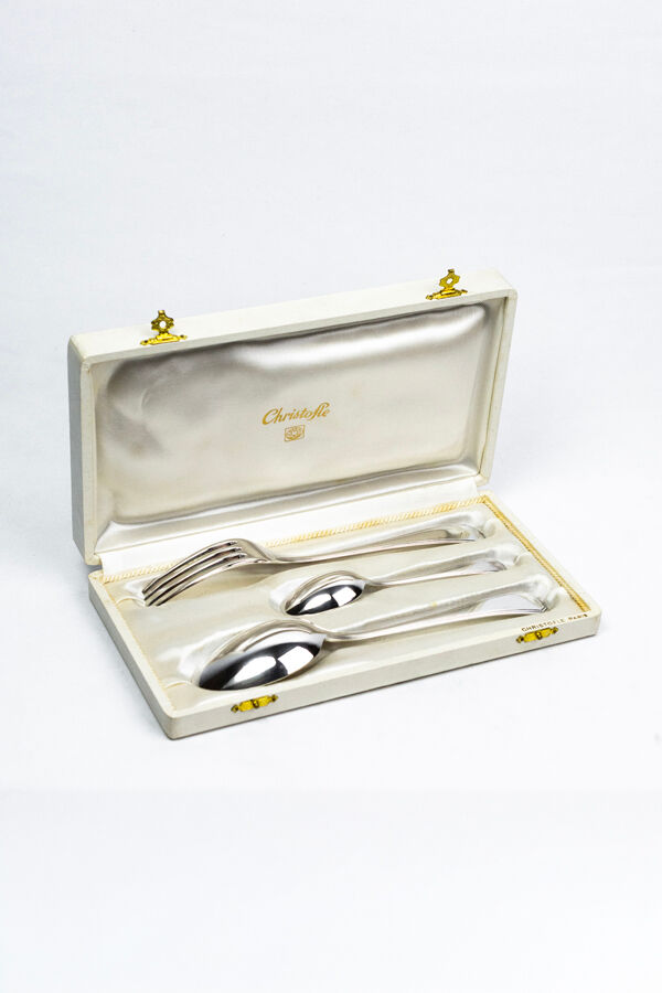 Three-piece birth set "America" — Christofle. 20th century.