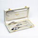 Three-piece birth set "America" — Christofle. 20th century.