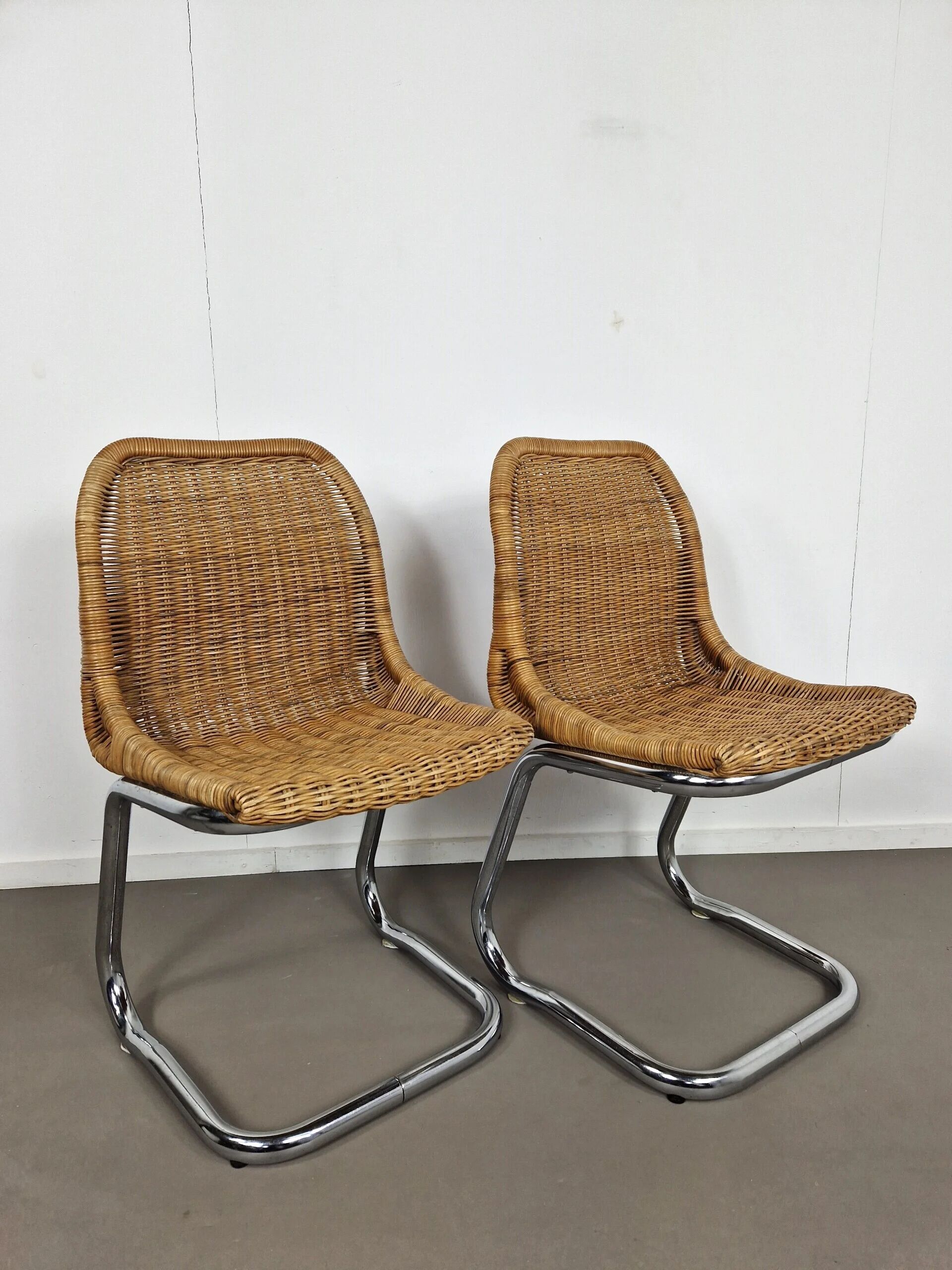 Pair of Rohé Noordwolde chairs | Rattan and chrome