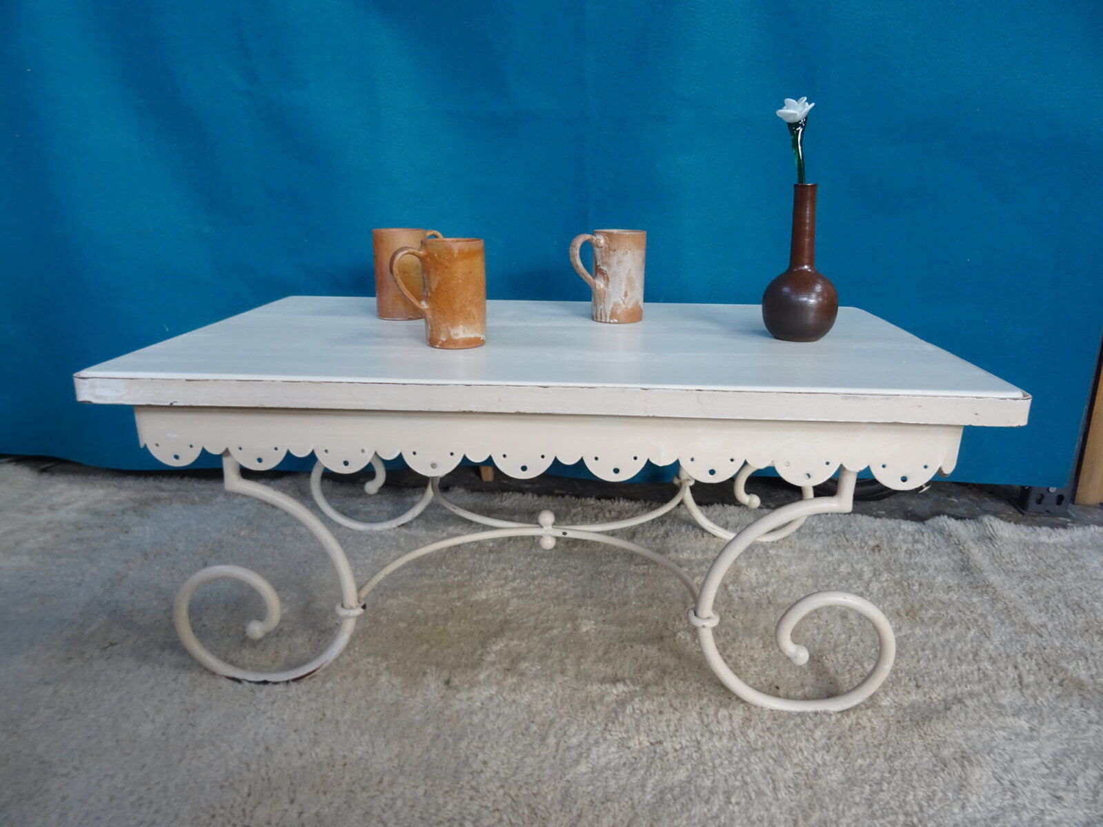 Wrought iron coffee table wooden top
