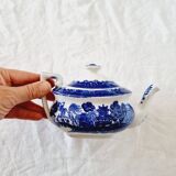 Small porcelain teapot or milk jug with the famous blue willow or weeping pattern