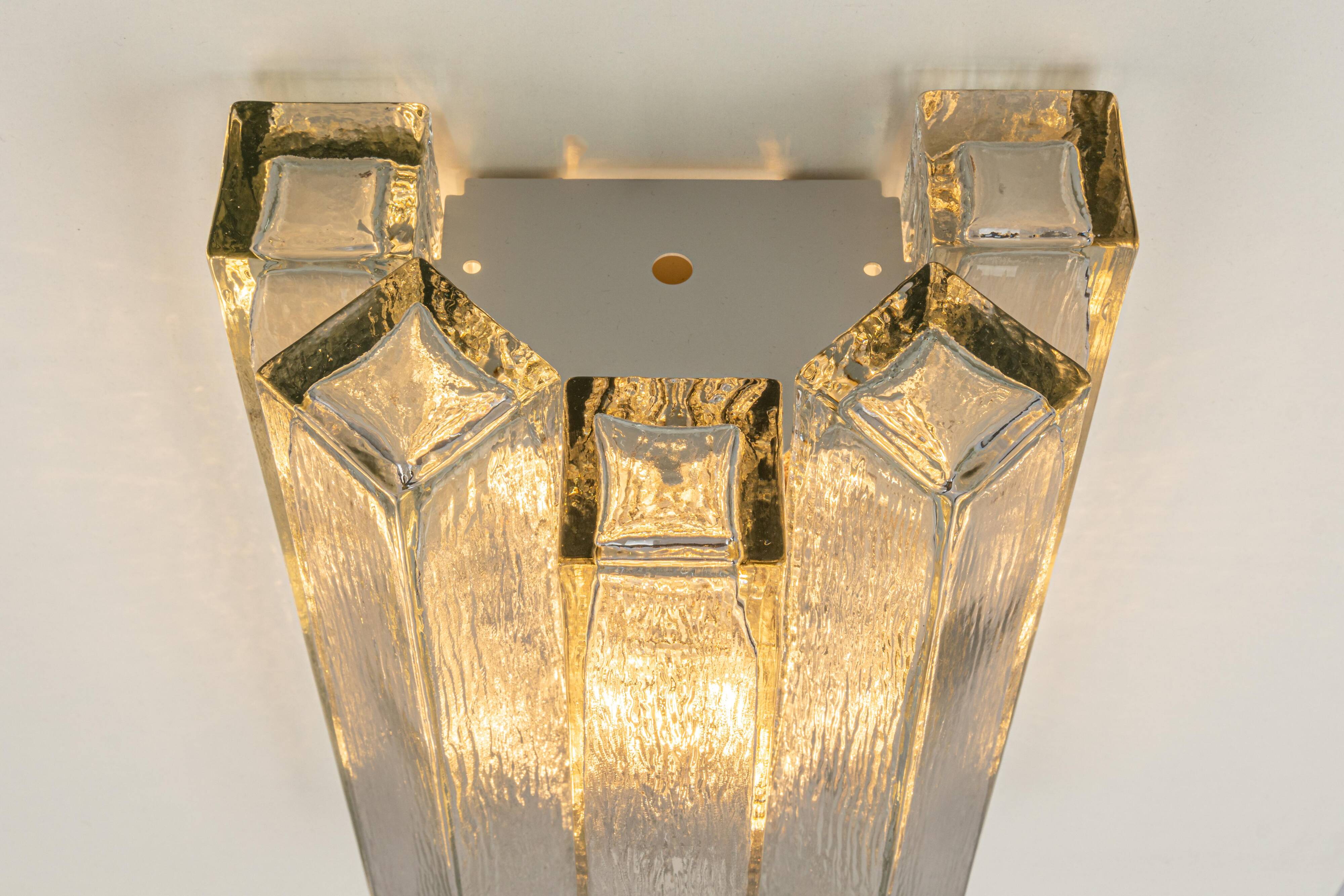 Large pair of wall sconces in brass and Murano glass by Doria, Germany, 1960s.