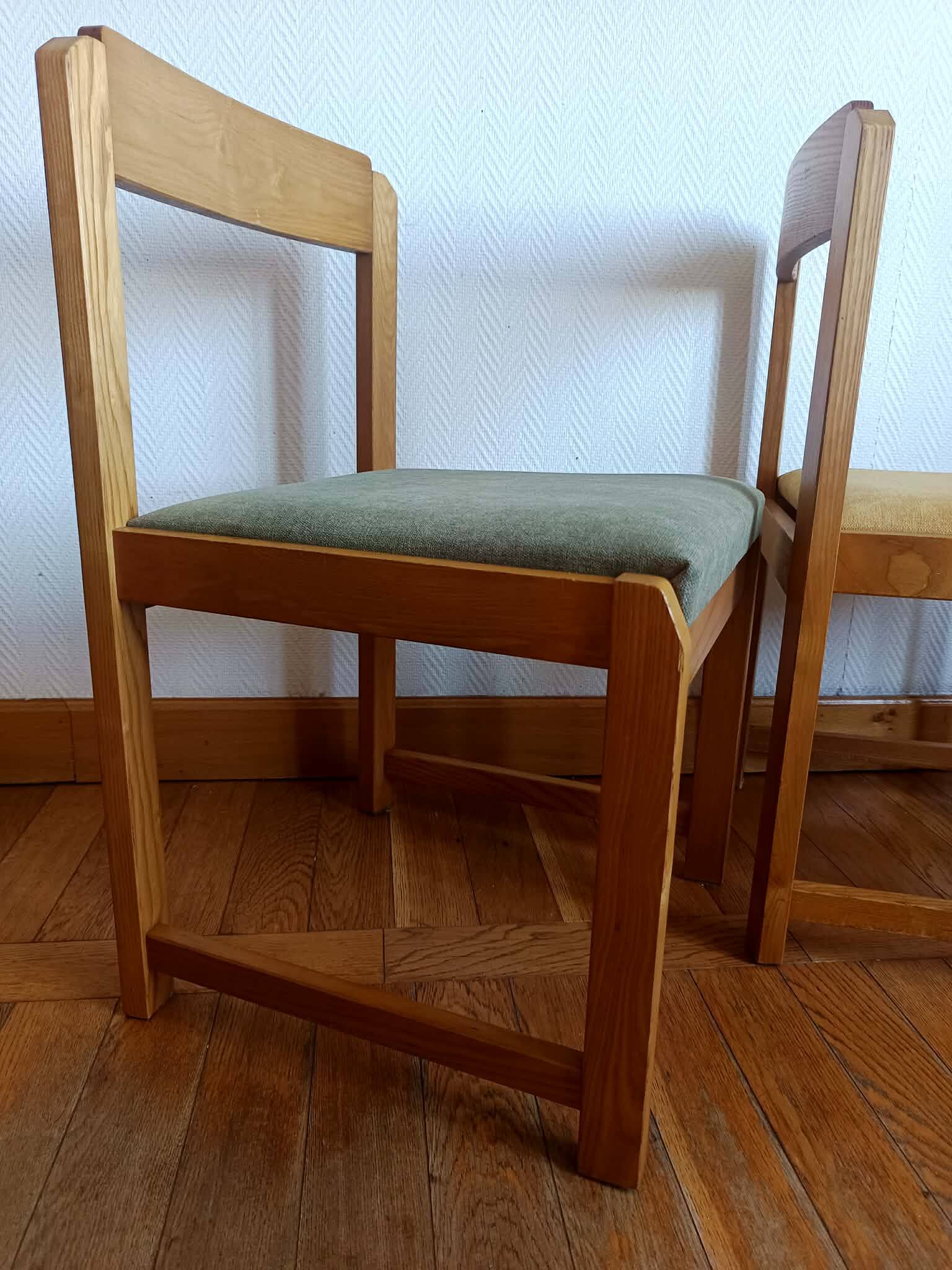 Six Scandinavian style chairs in elm and fabric.