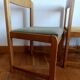 Six Scandinavian style chairs in elm and fabric.