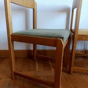 Six Scandinavian style chairs in elm and fabric.