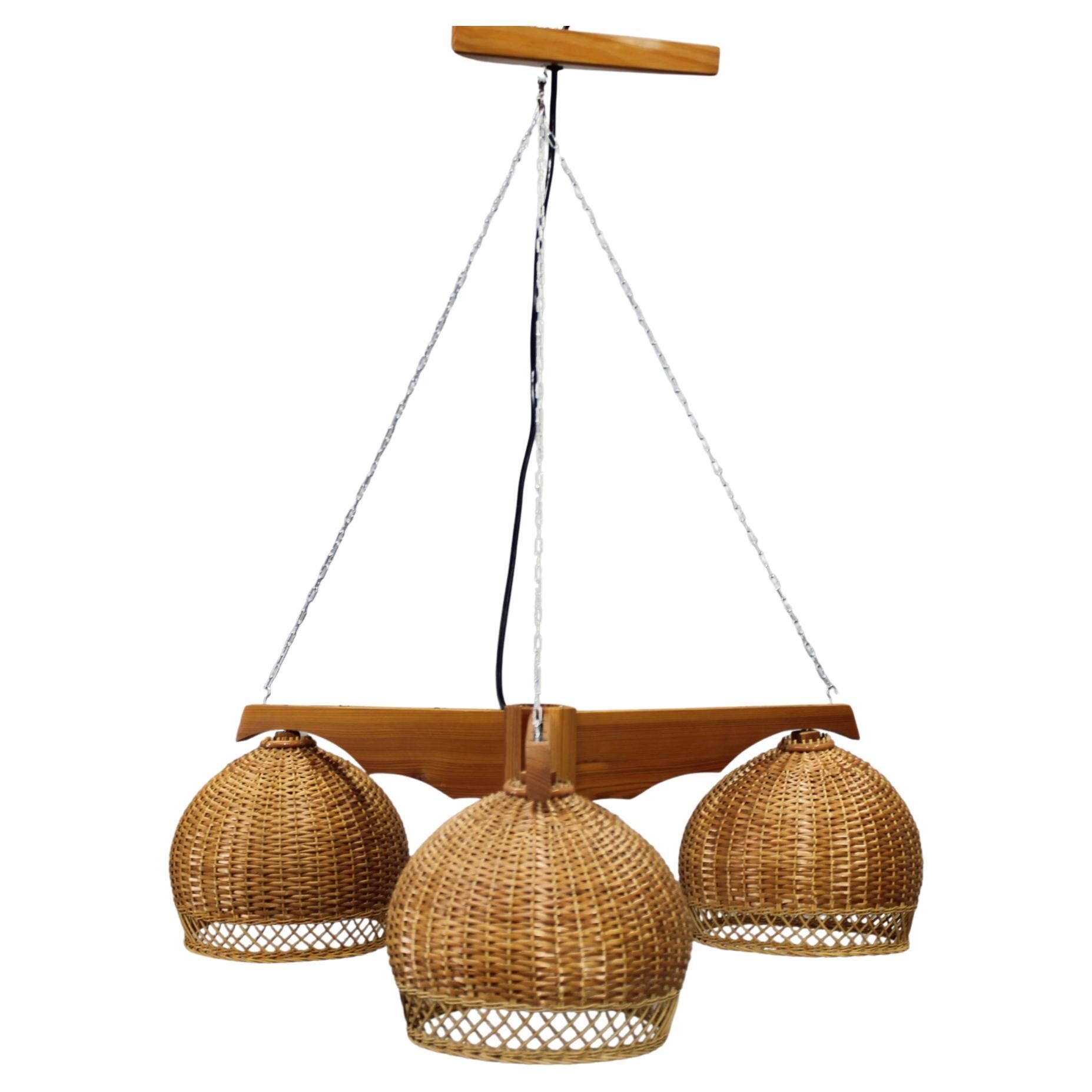 1970s Czechoslovakian rattan & pine pendant light, three-shade chandelier