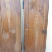 Pair of antique cherry wood cabinet doors from the 19th century in their original part