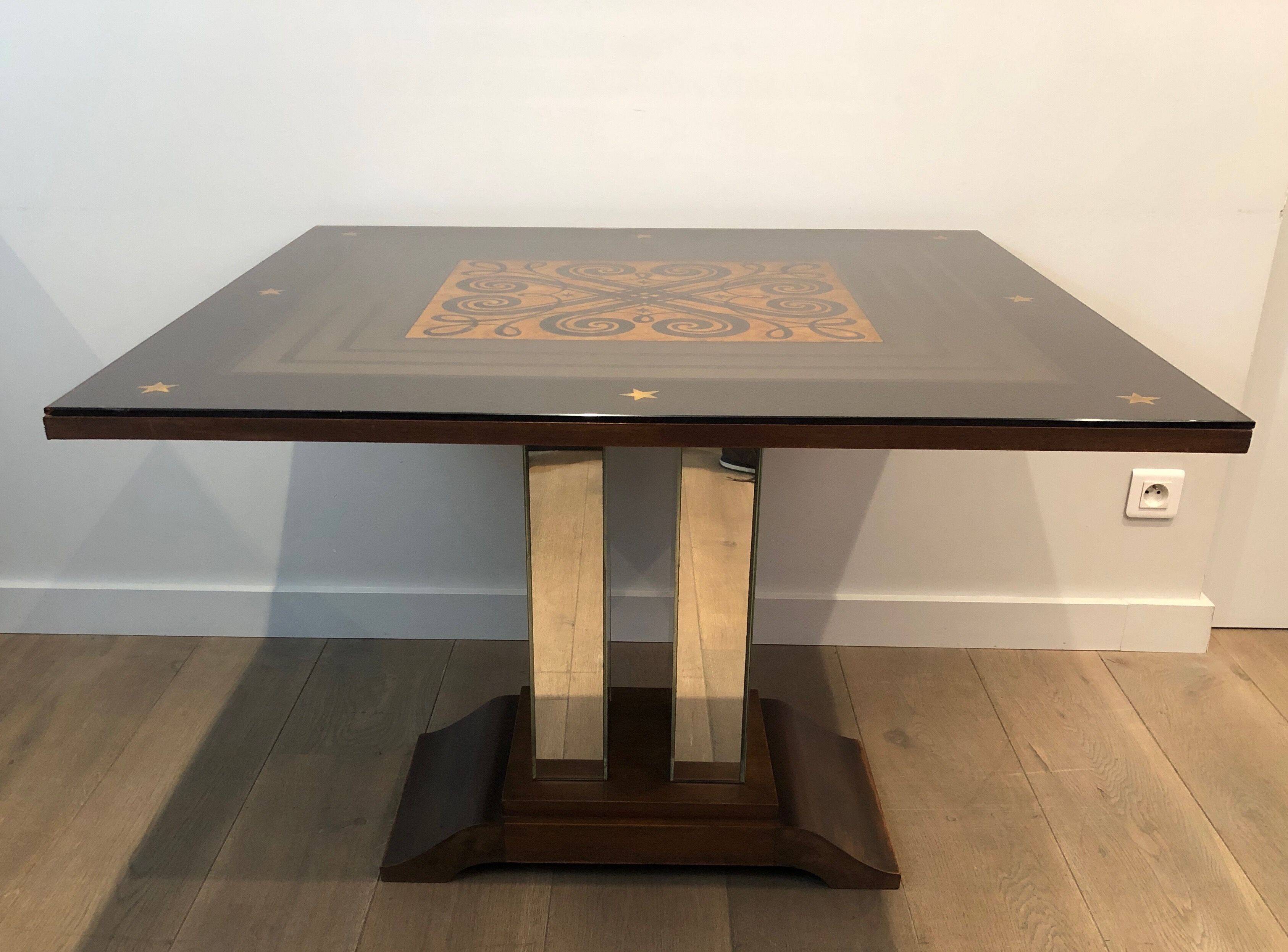 Art Deco centre table with a mirrored eglomisé top in the style of Jules Leleu and Max Ingrand.
