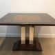 Art Deco centre table with a mirrored eglomisé top in the style of Jules Leleu and Max Ingrand.