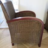2 armchairs in woven rattan and wood, 1980s