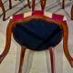 12 chairs in oak, carved wood with fleurette decorations, fabric seat