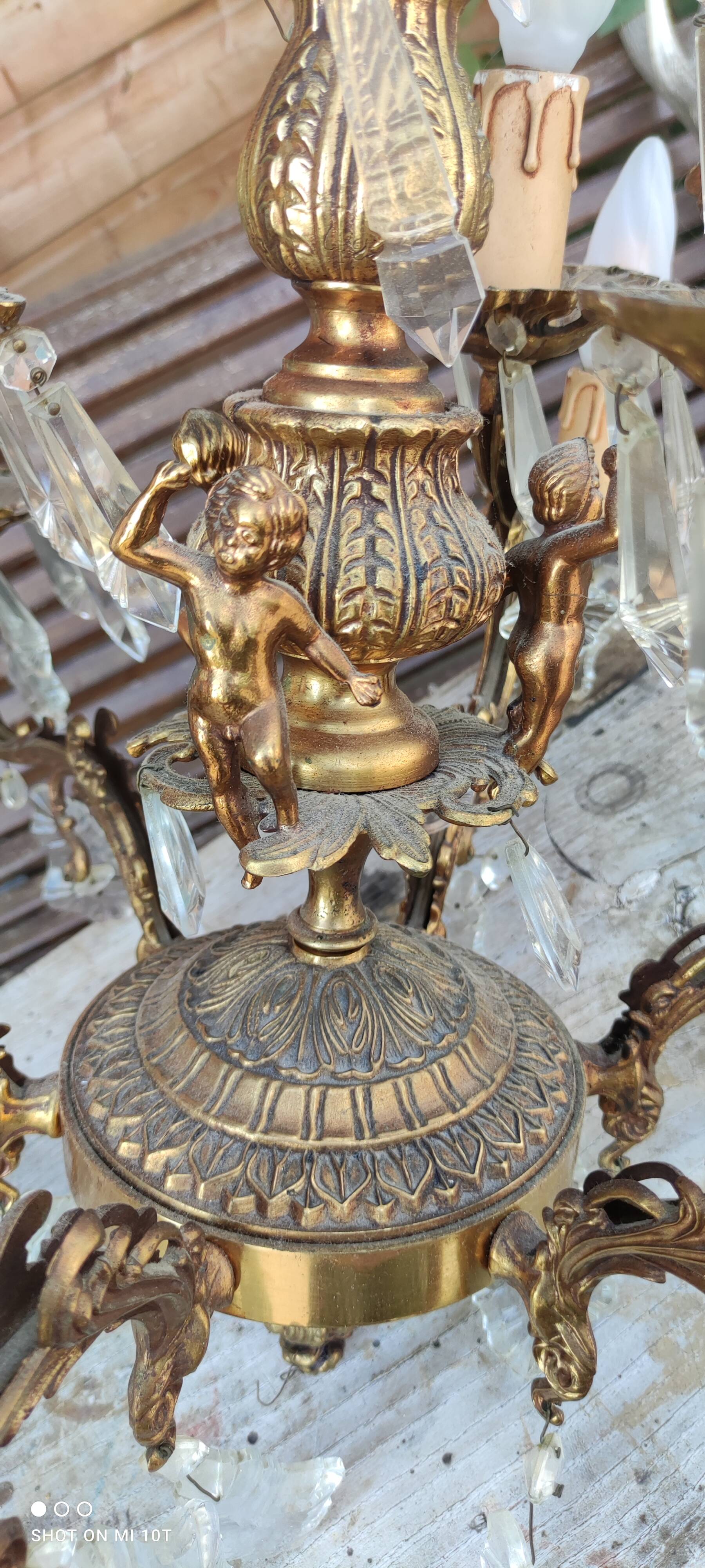 Old bronze chandelier/stamps and angel décor