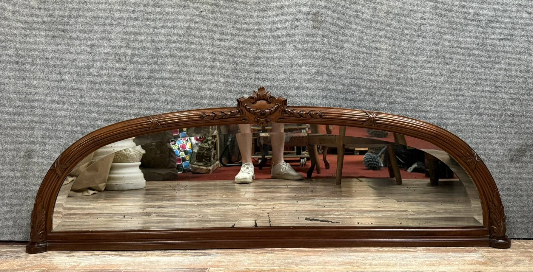 Very large Louis XVI style half-moon mirror in mahogany