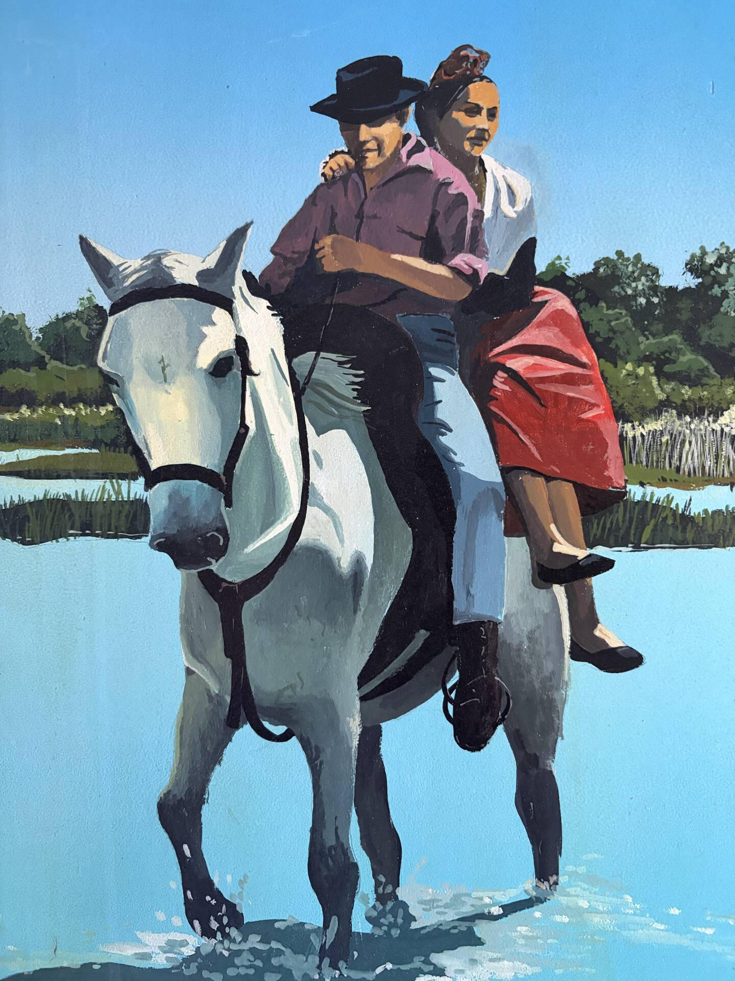River crossing on horseback, on a sign by Campana.