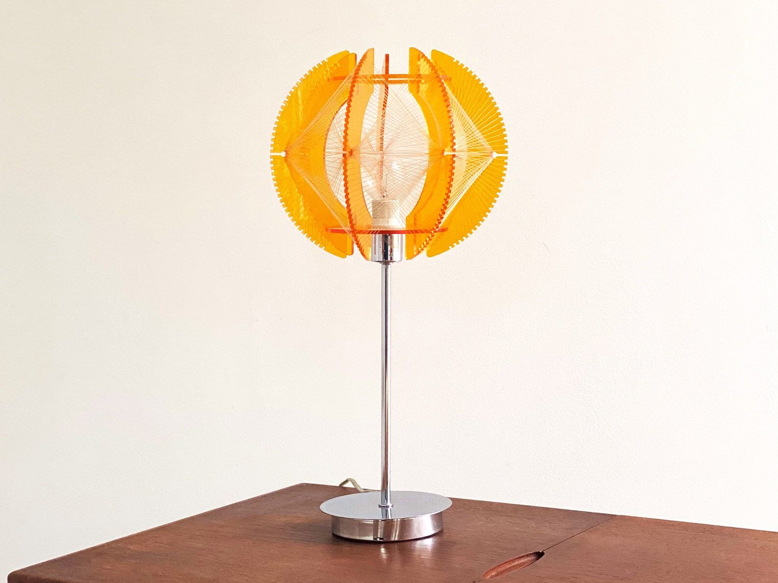 Space Age acrylic table lamp with a nylon wire thread & orange acrylic shade