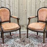 Pair of Louis XVI style armchairs in molded beech, work from the 1950s