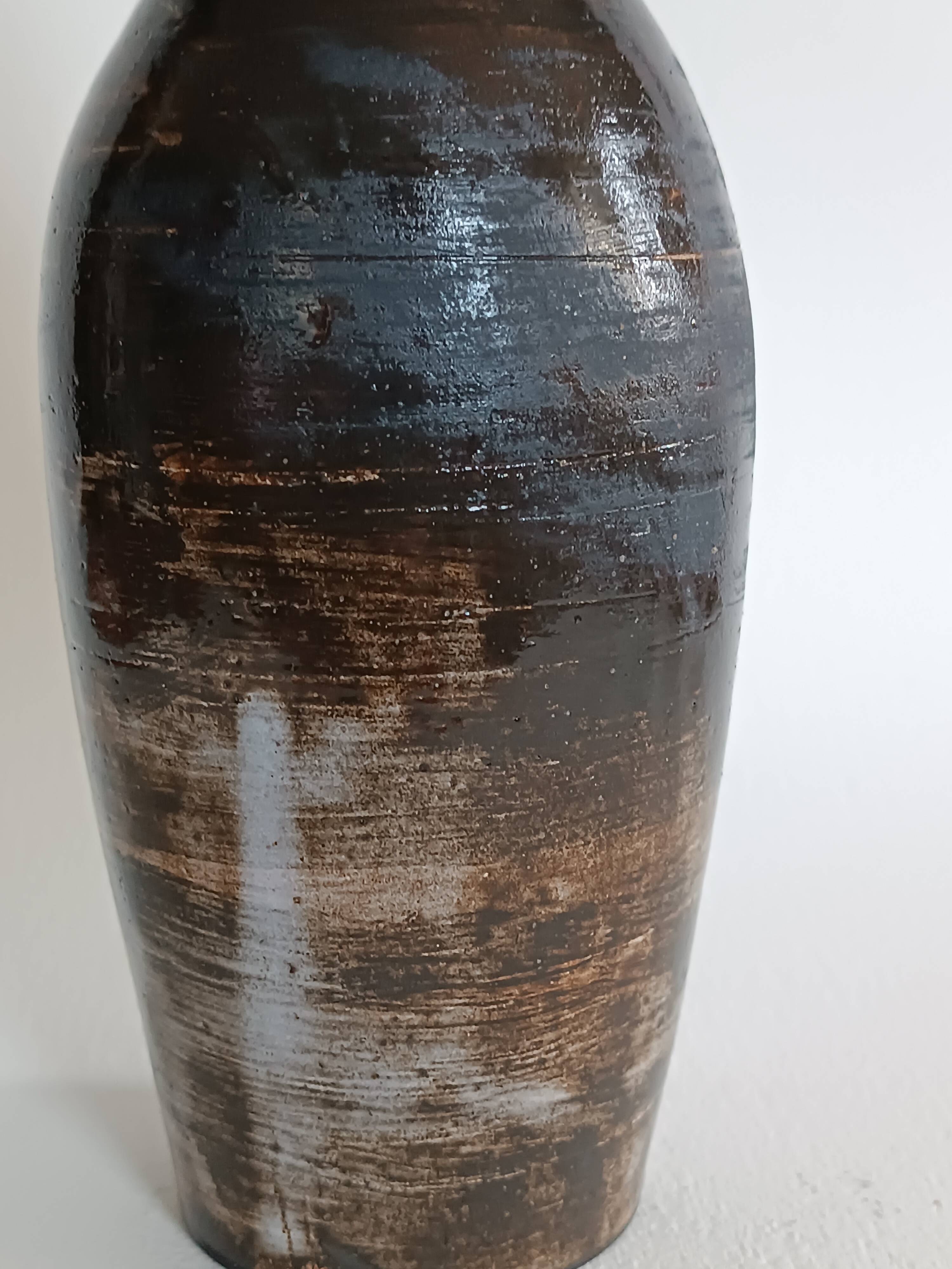 A bottle and six ceramic cups by Gérard Hofmann Vallauris 1950.