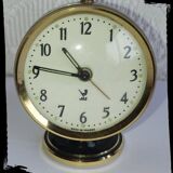 Jaz clock of black round mechanical travel, 60s/70s