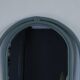 Sage green painted rattan mirror
