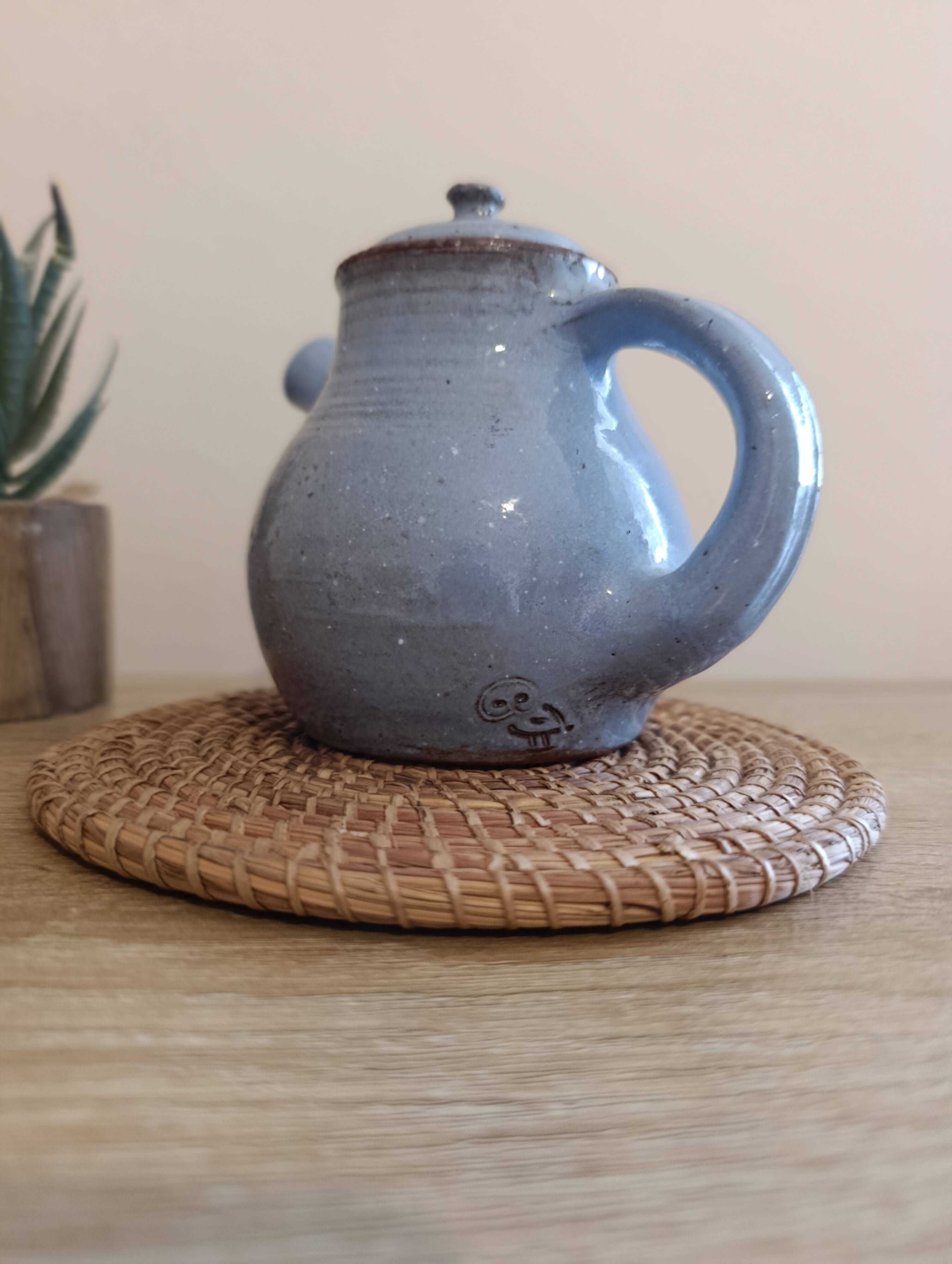 Ceramic teapot in blue/grey glaze, signed by Jeanne and Norbert Pierlot.