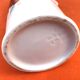 White porcelain bottle with fruit decoration