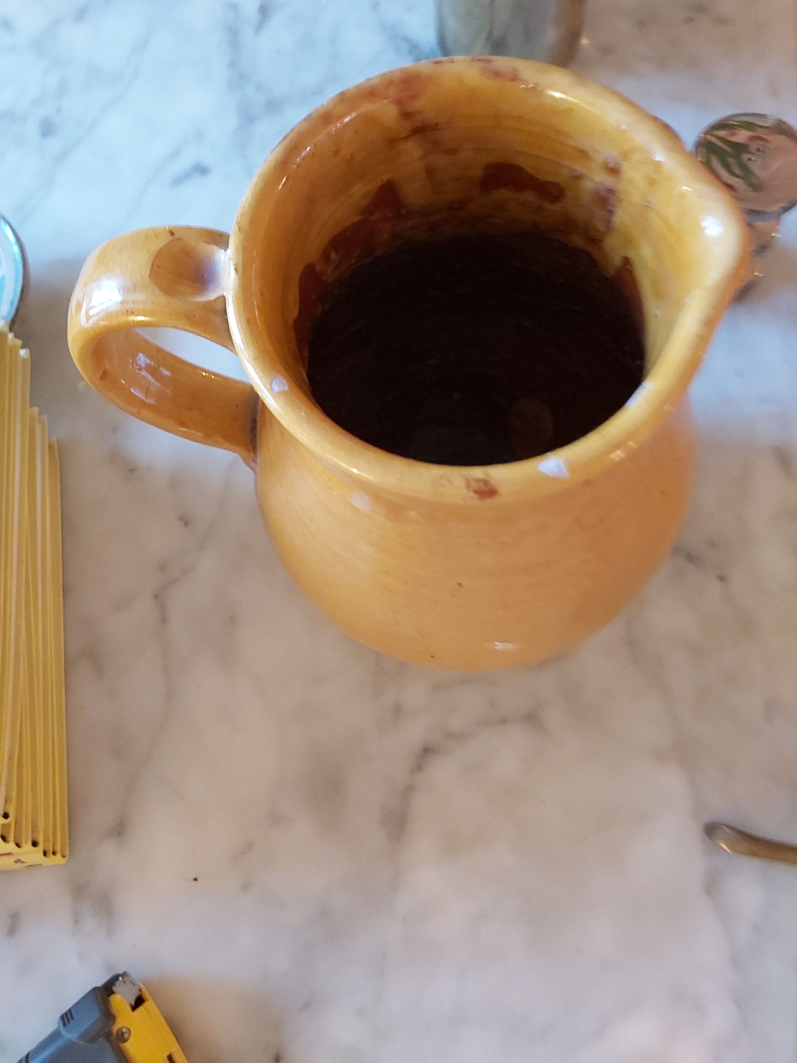 Vintage enamelled ceramic pitcher