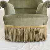 sage green toad armchairs with gold fringe