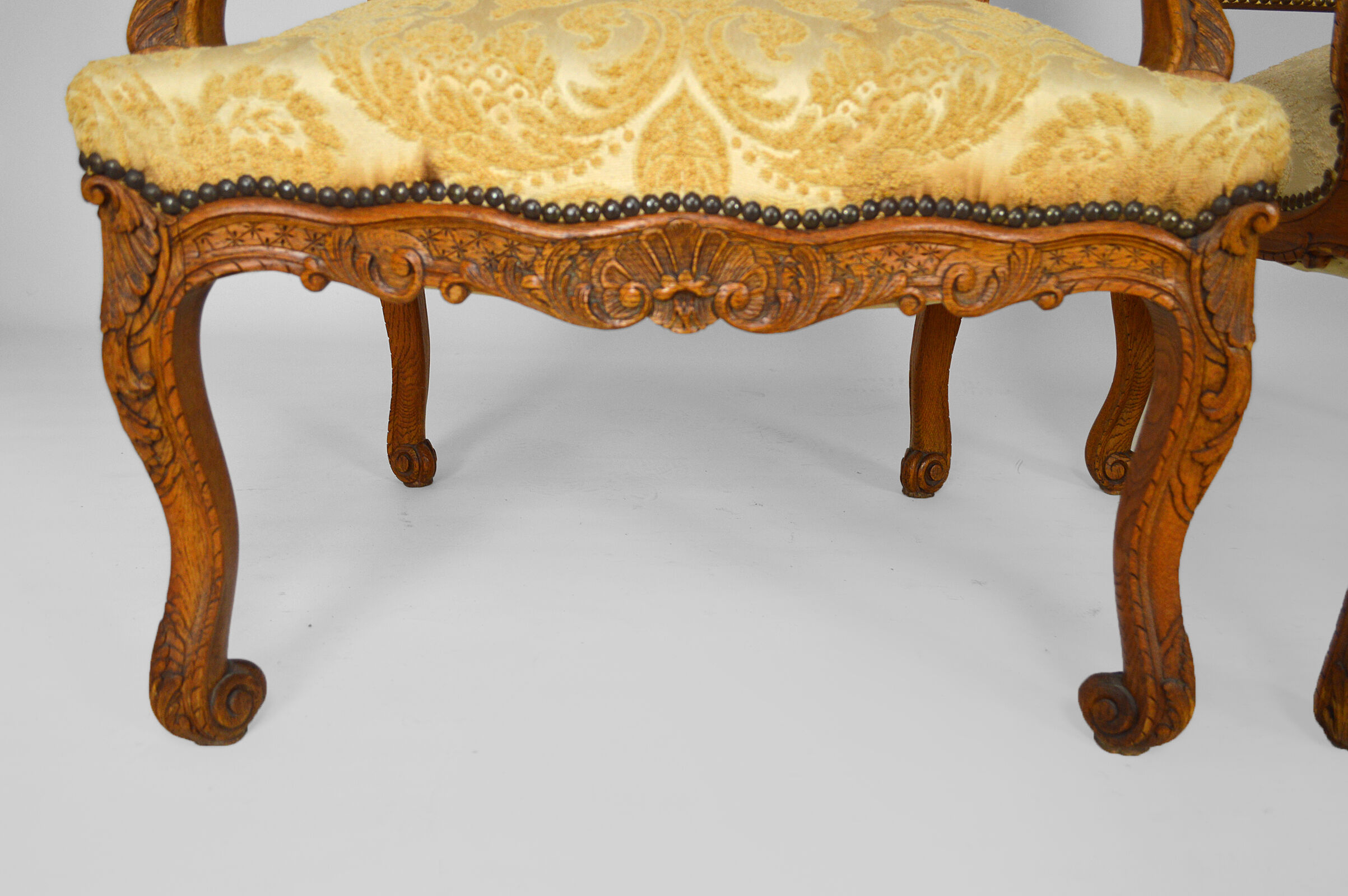 Set of 2 armchairs in carved oak, Louis XV style