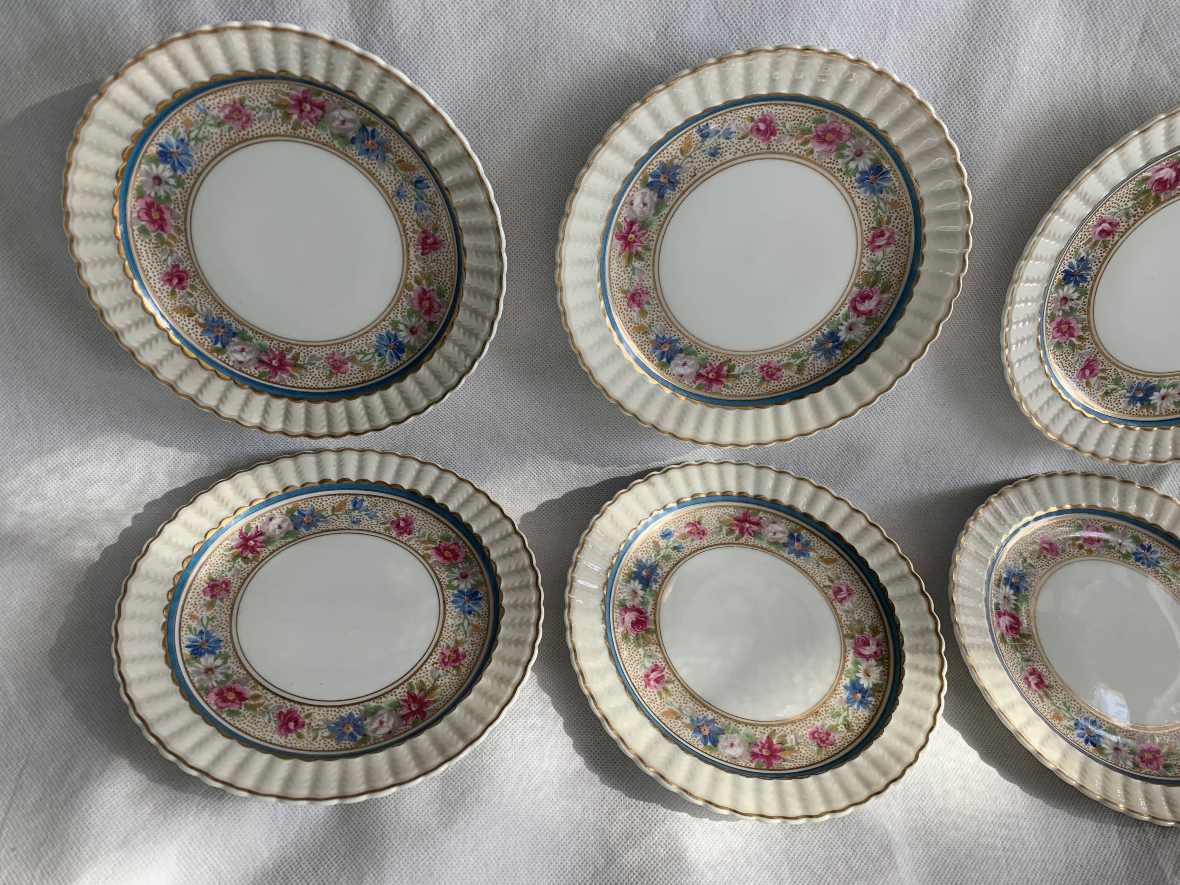 Dessert service 10 plates and a Bernardaud Limoges porcelain cake dish