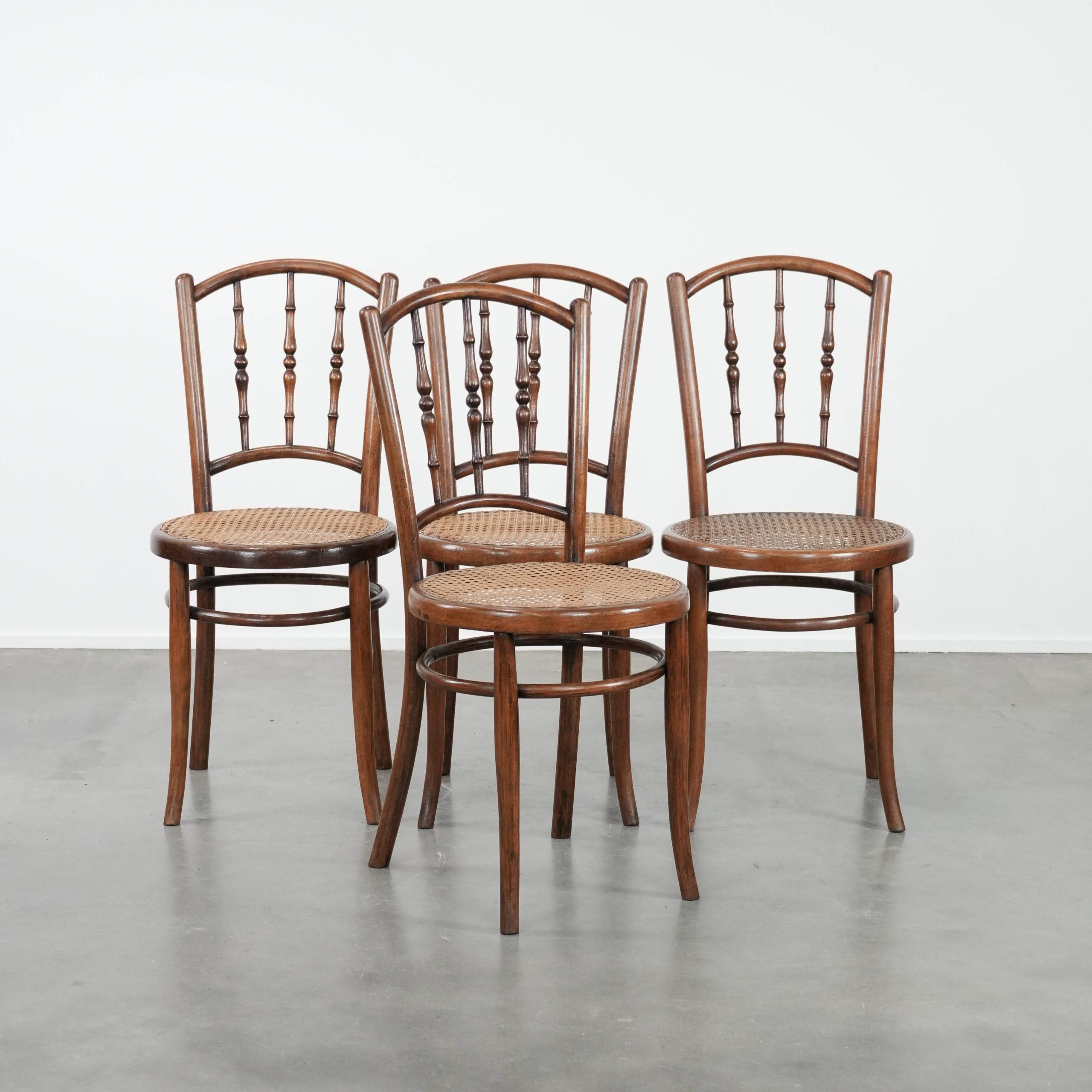 Set of 4 vintage bistro chairs Jacob & Josef Kohn Wien with a wicker seat