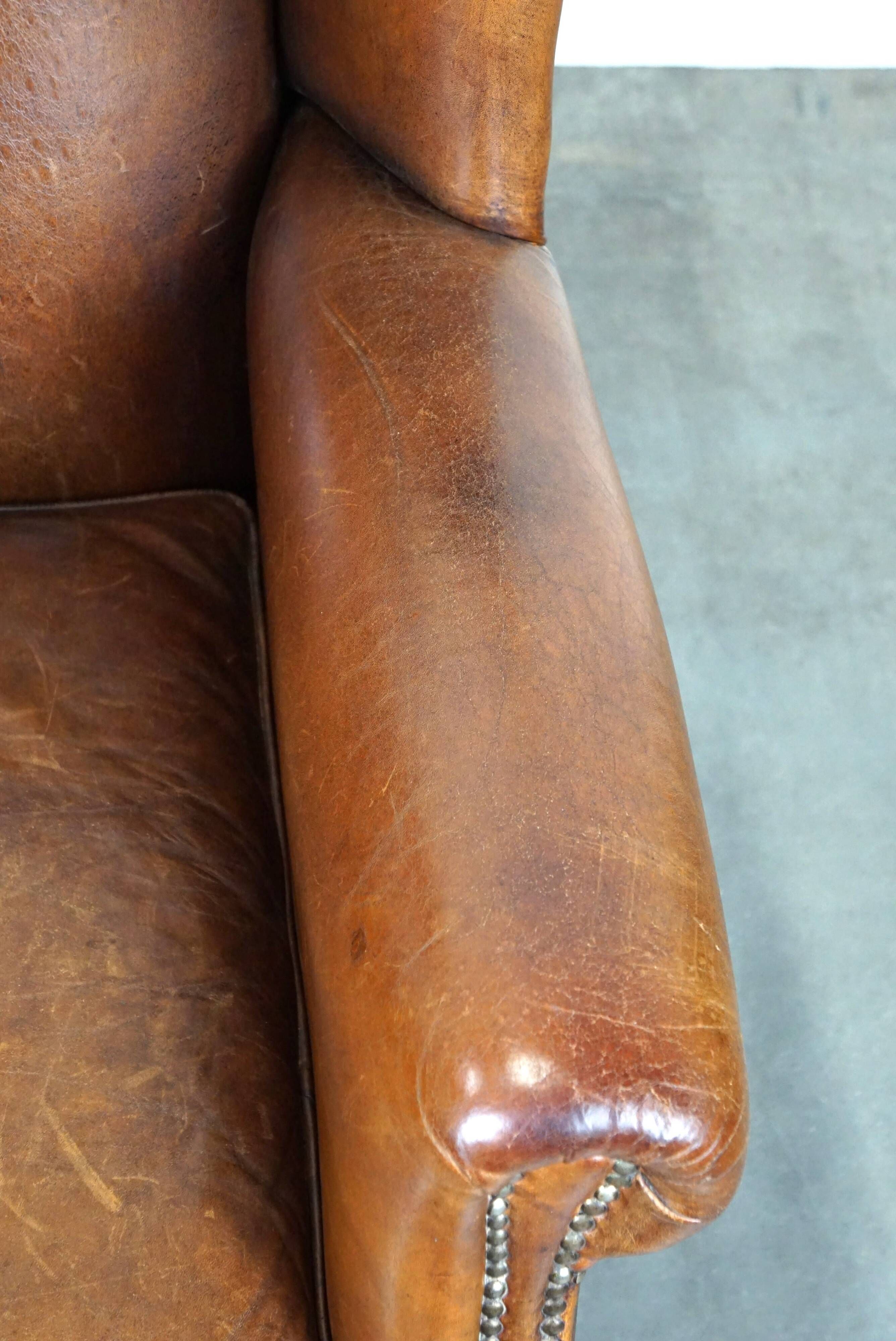 Especially comfortable wingback chair made of sheepskin leather, stunning colors