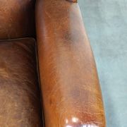 Fauteuil à oreilles particulièrement confortable en cuir de mouton, couleurs époustouflantes