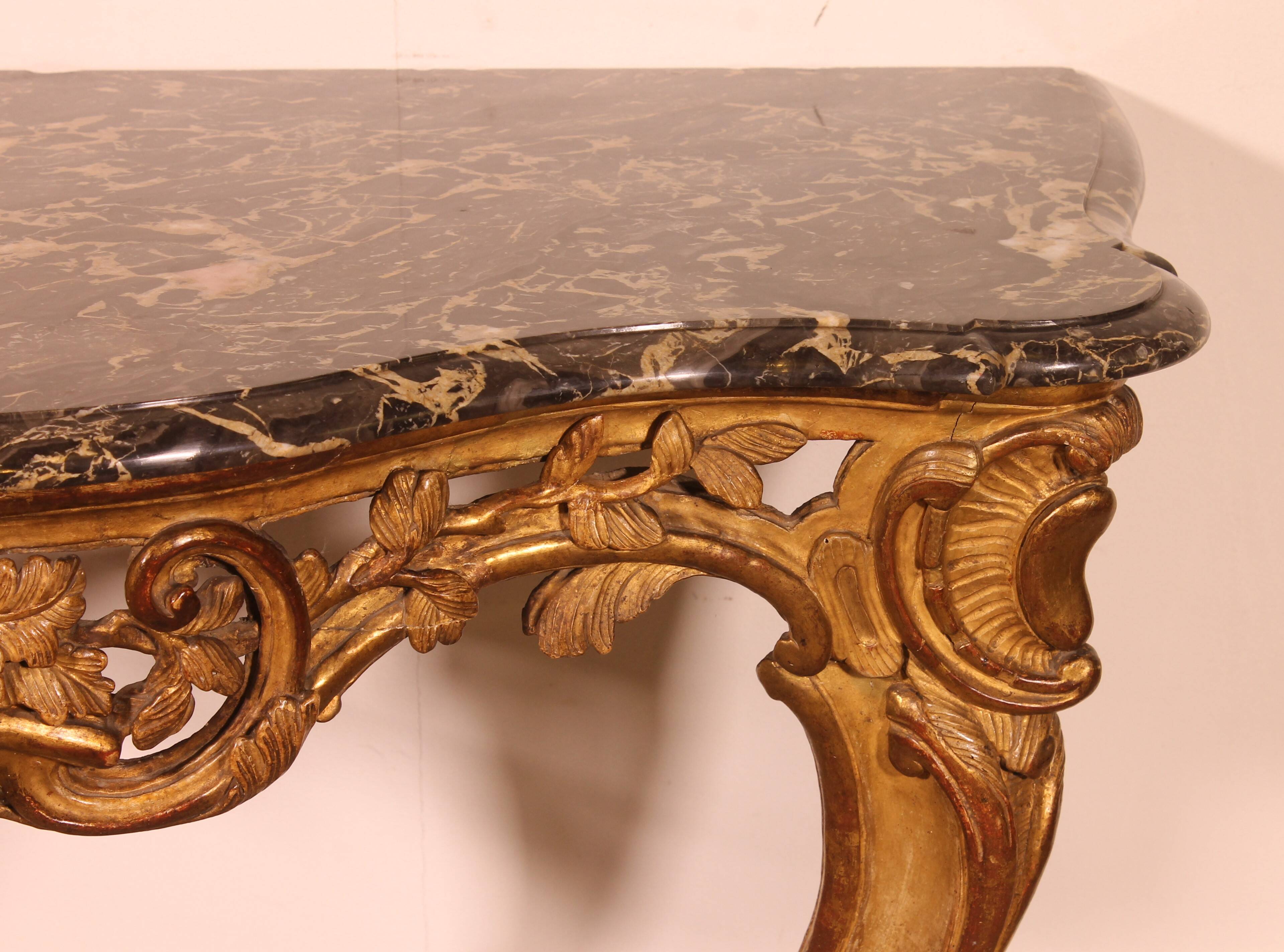 Louis XV period console in gilded wood