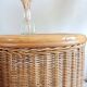 Pair of wicker bedside tables circa the 1970s.