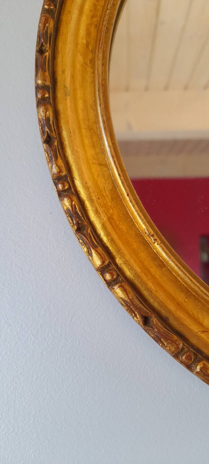 Round golden mirror, 1970.
