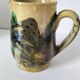 Glazed earthenware pitcher with abstract polychrome decoration, handmade.