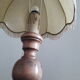 Turned wood table lamp with “skin” shade