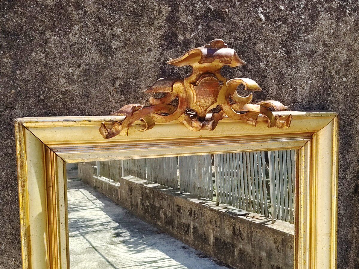 Large mirror/19th-century wooden frames, gilded.