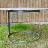 Round marble table with chrome base.