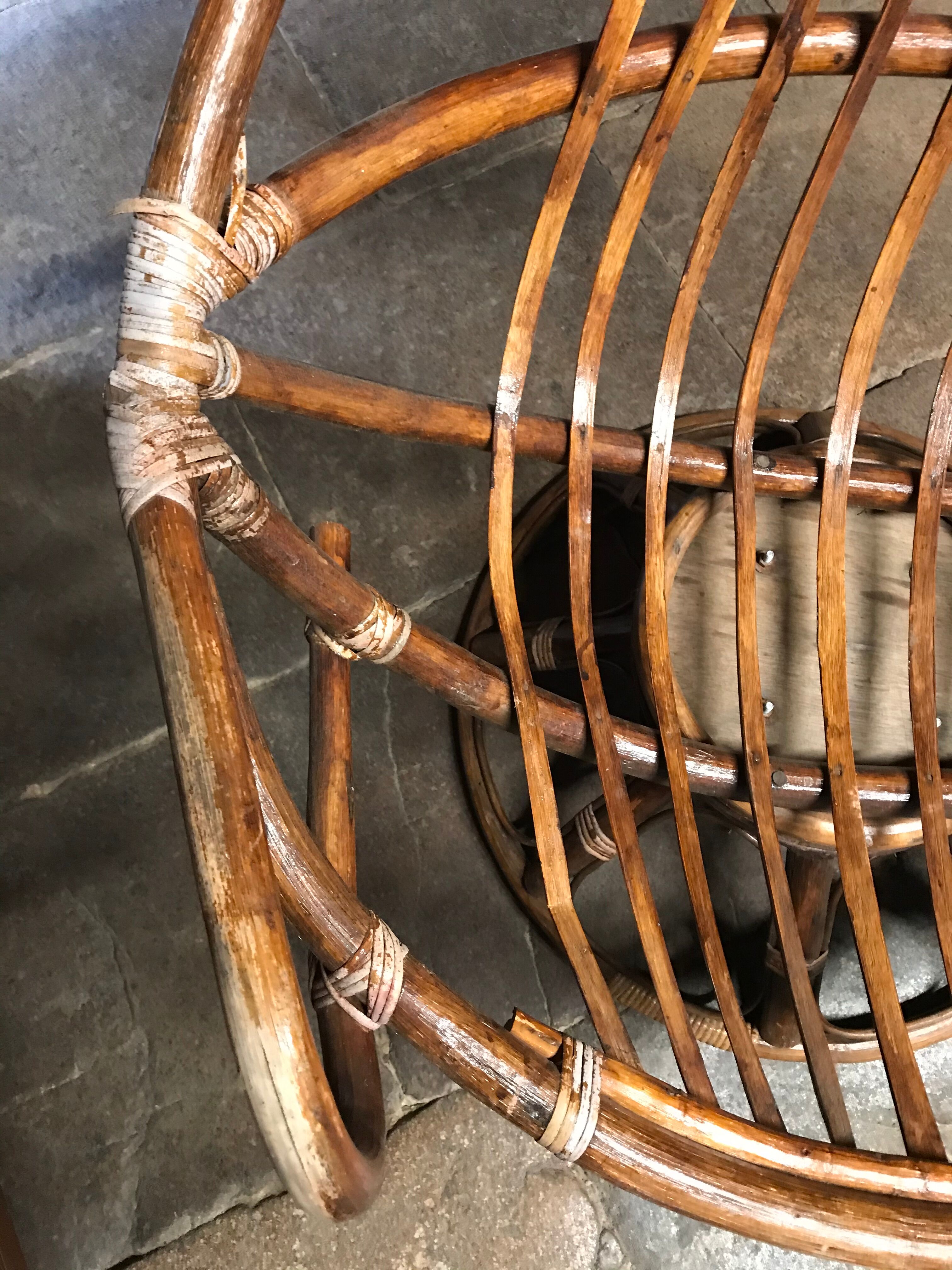 Swivel rattan armchair