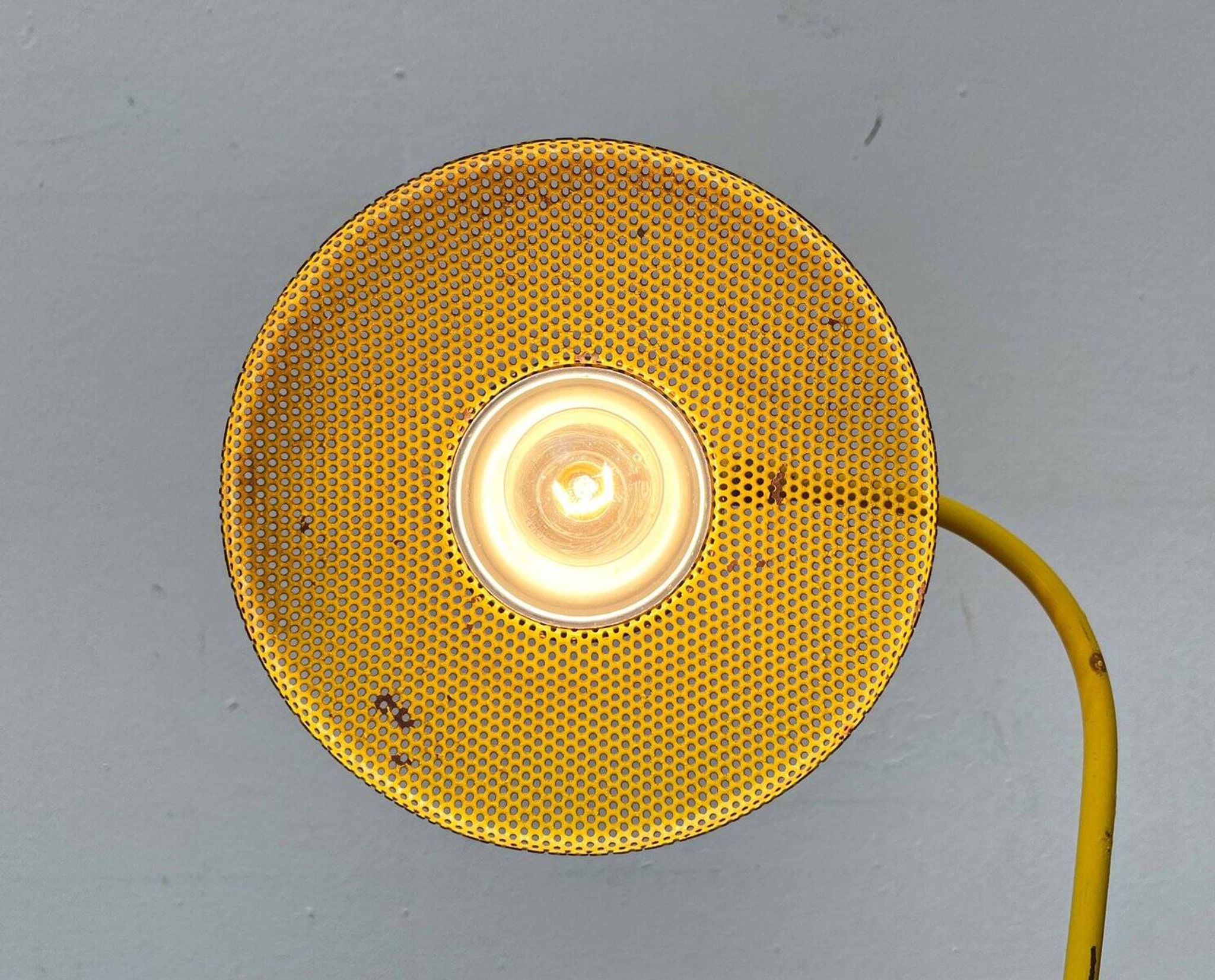 Perforated metal table lamp in Mid-Century Modern style, in the style of Mathieu Matégot, 1960s.