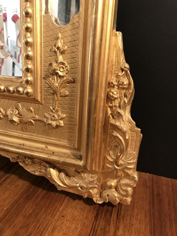 Miroir à parclose dorure à la feuille glace biseautée  170x98cm