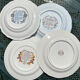 Composition of 4 flat earthenware plates, Gien