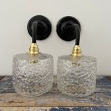 Set of two chiseled glass sconces