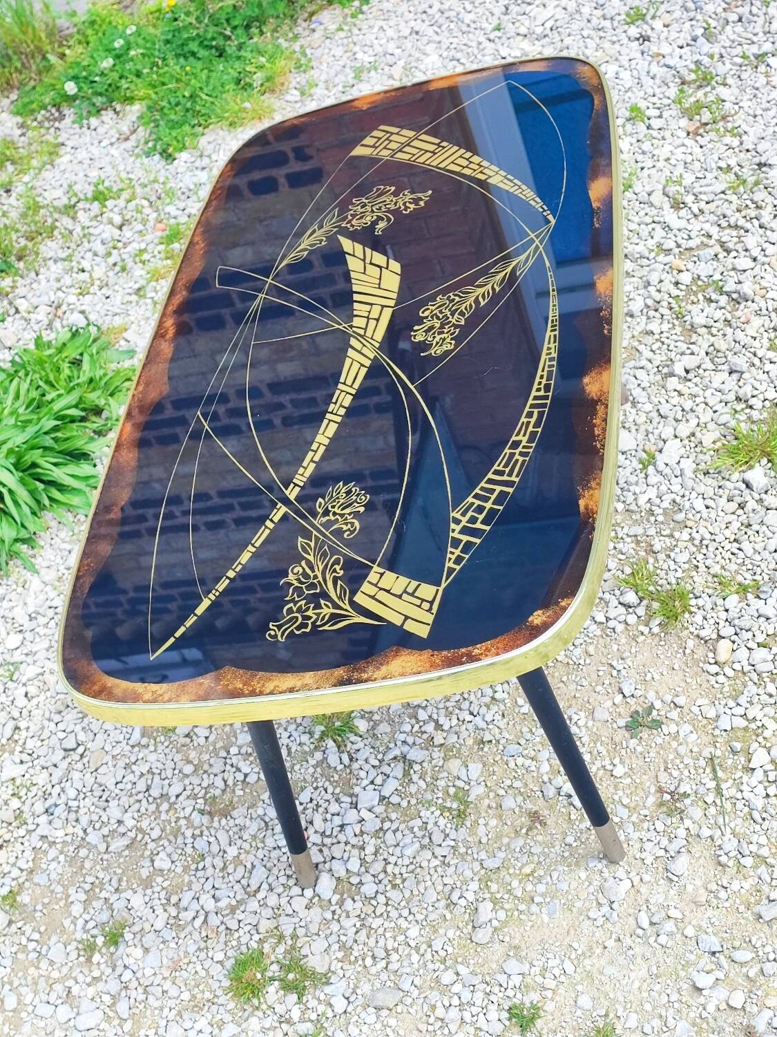 Vintage coffee table with compass legs