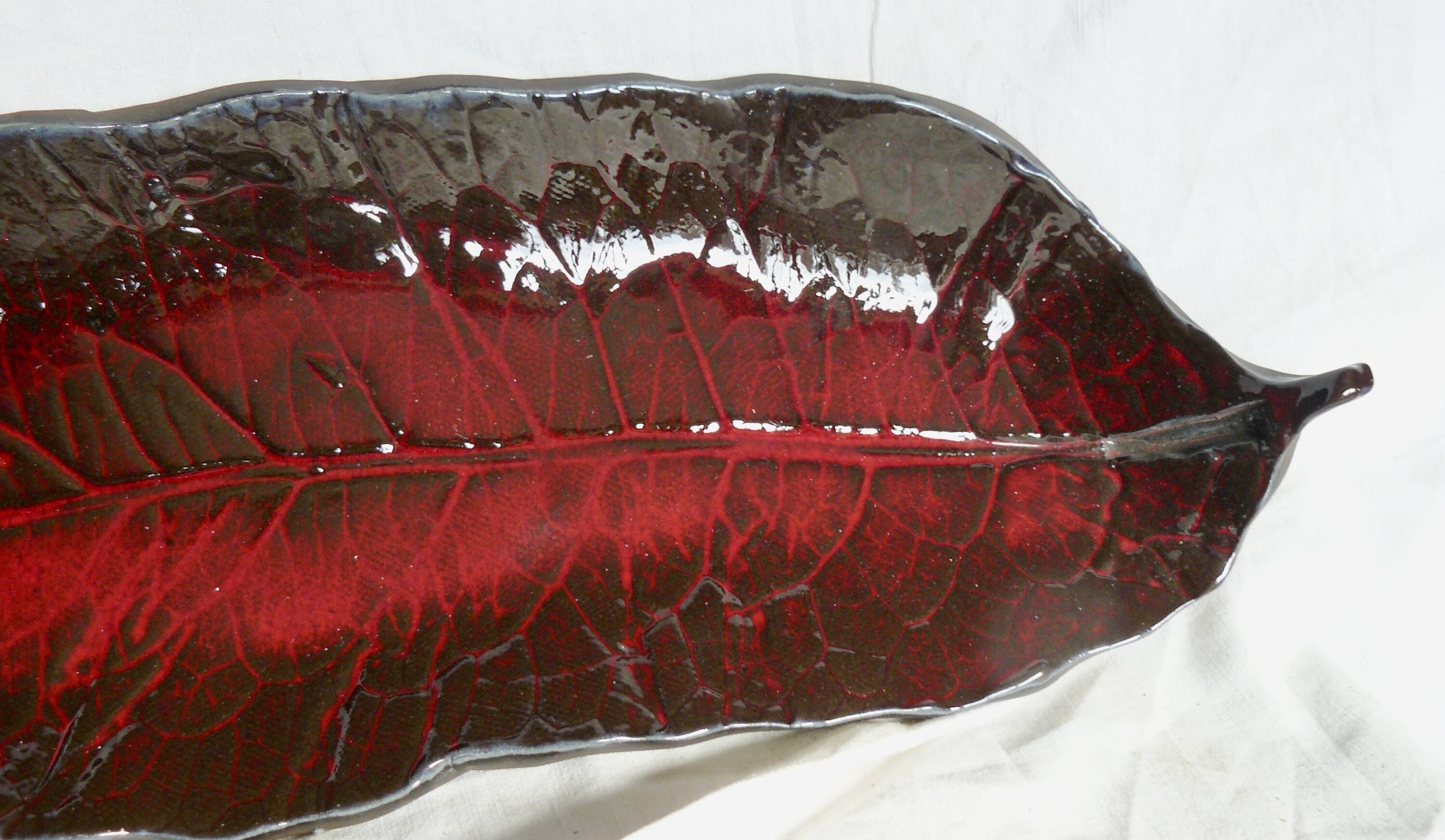 Vintage 1980s ceramic dish in the shape of a banana leaf