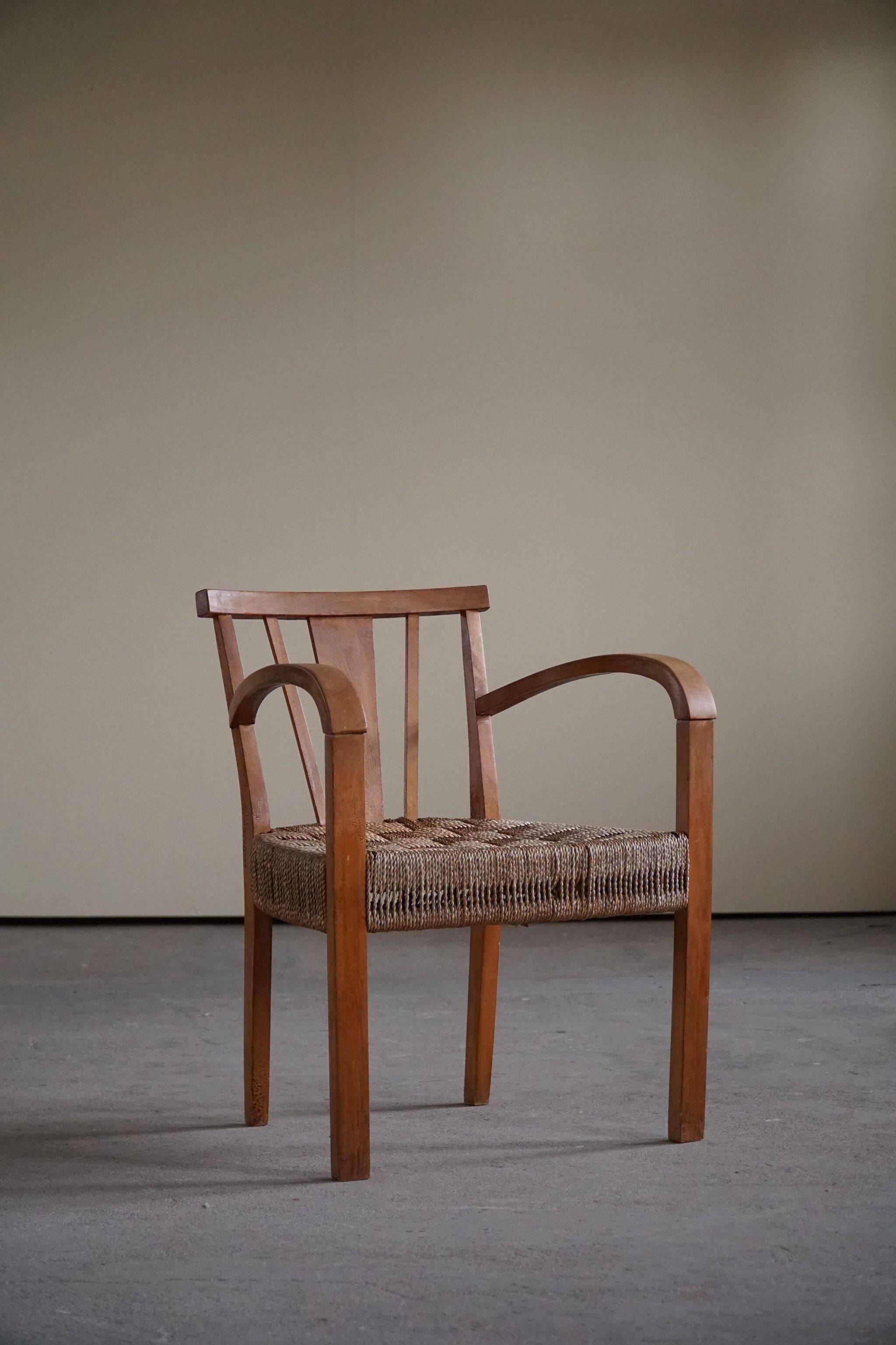 Modern Danish lounge chair in beech and paper cord, in the style of Frits Schlegel.