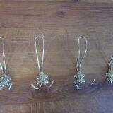 Set of 4 hooks in gilded metal