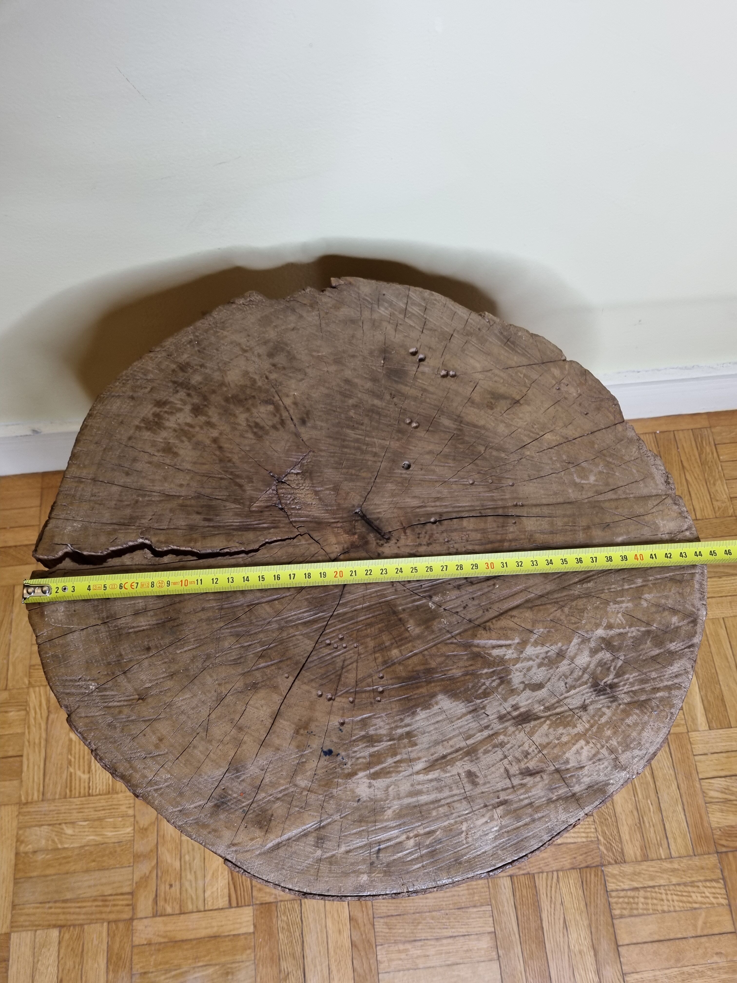 Brutalist solid wood coffee table carved from a room in a plane tree trunk