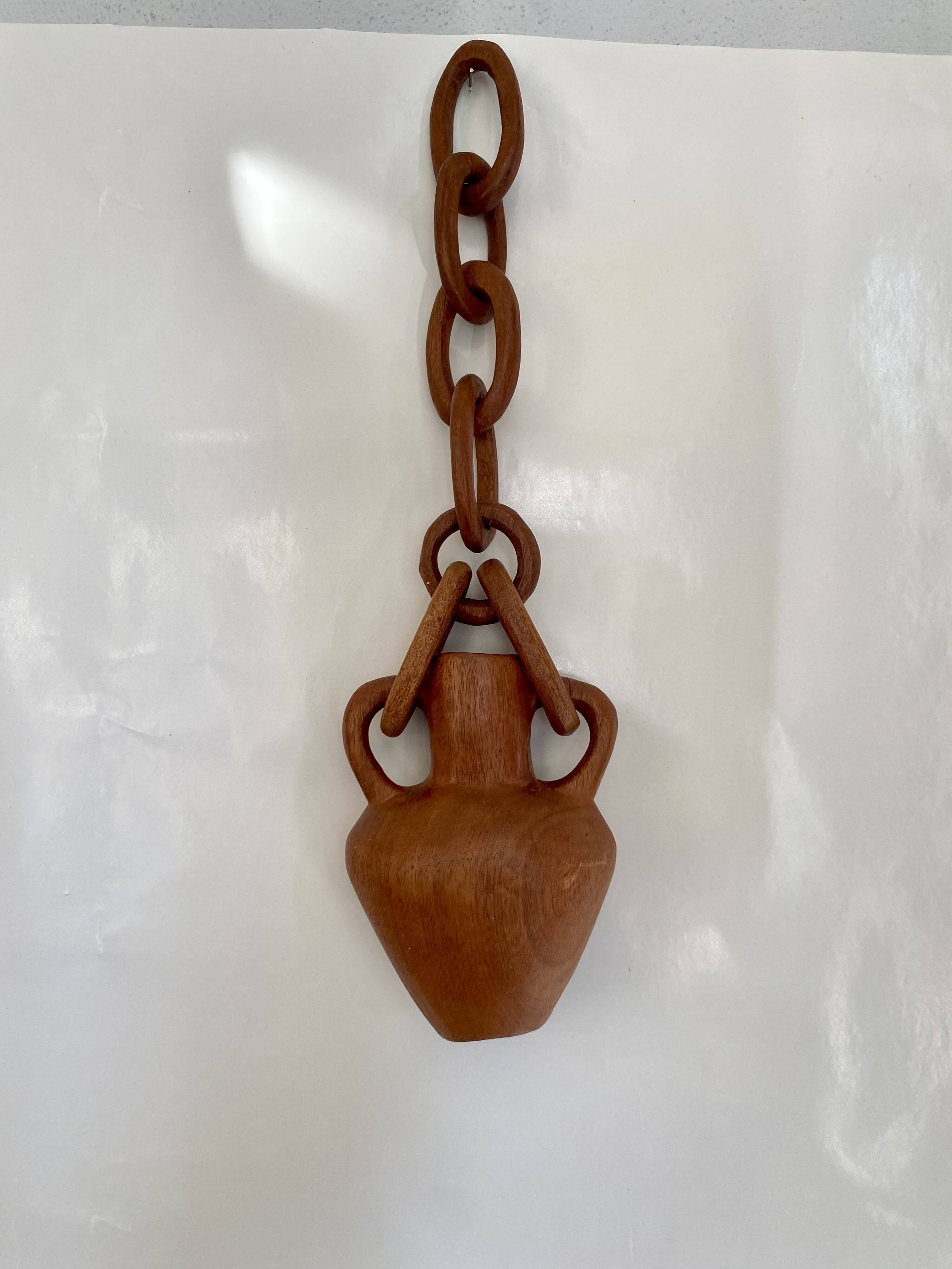 Vase and wooden chain to hang
